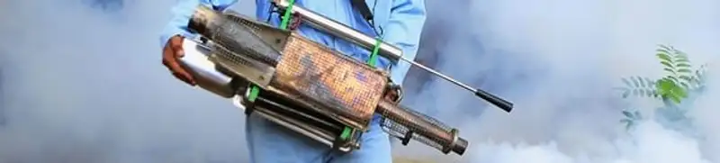 Fumigation technician using a fogger for deep pest treatment in Yonkers, NY